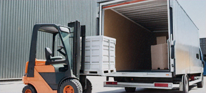 forklift unloading a truck
