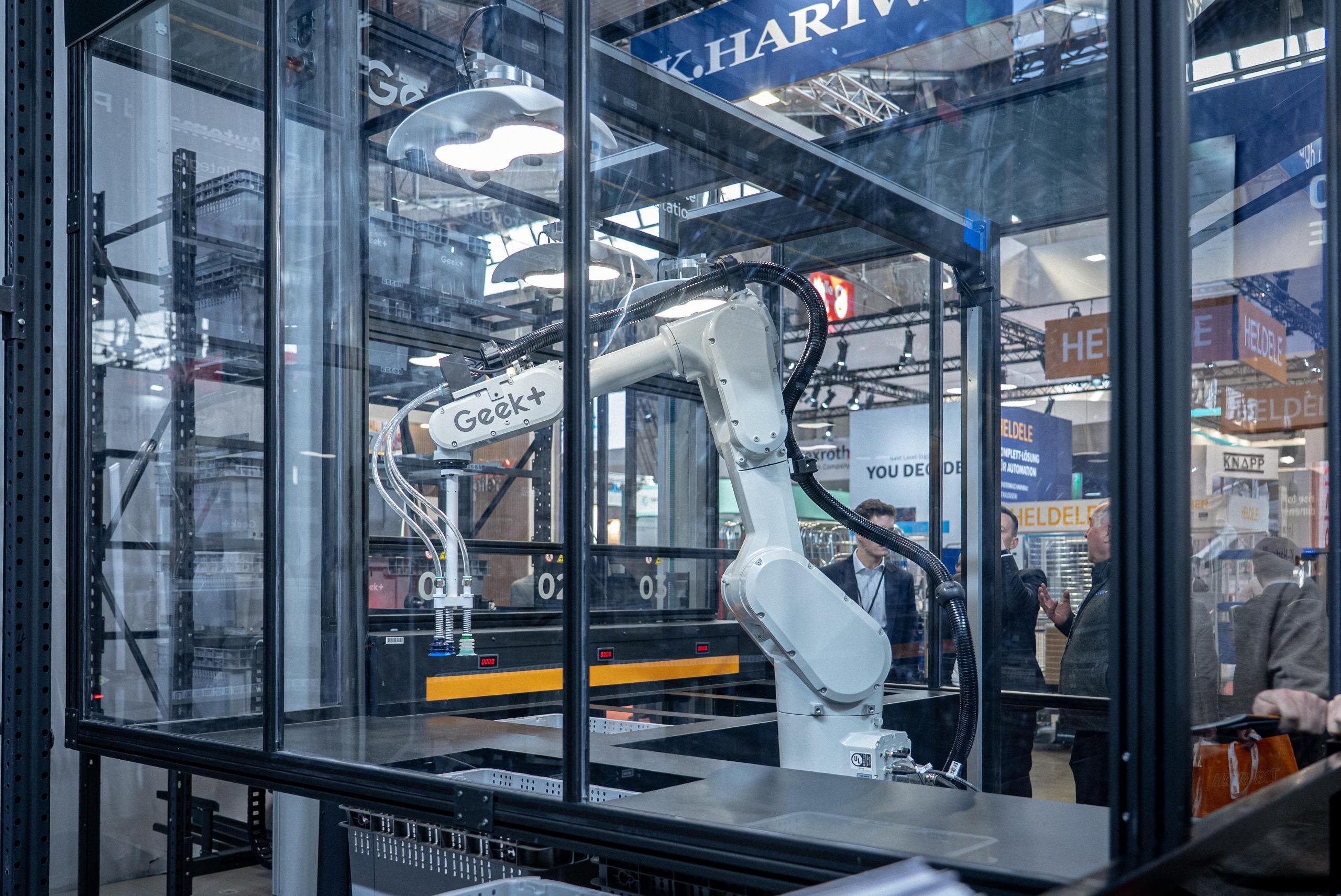 logimat robot arm picking station