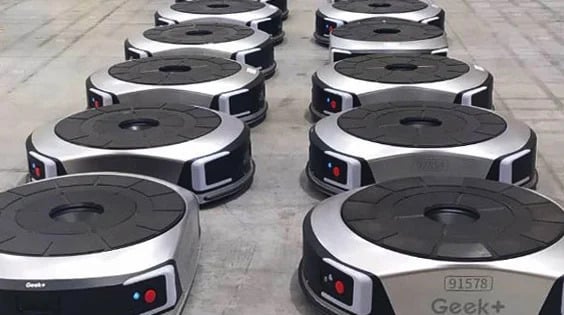 How does retail giant Walmart successfully reduce cost and increase efficiency?